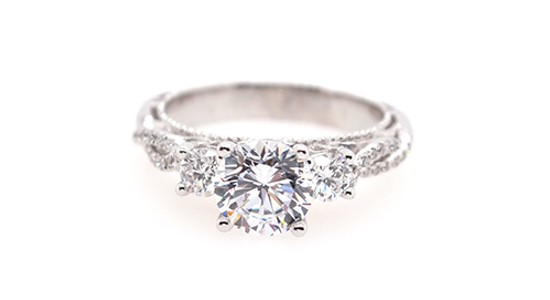 a white gold, three stone, vintage-inspired engagement ring