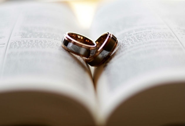 wedding band on book